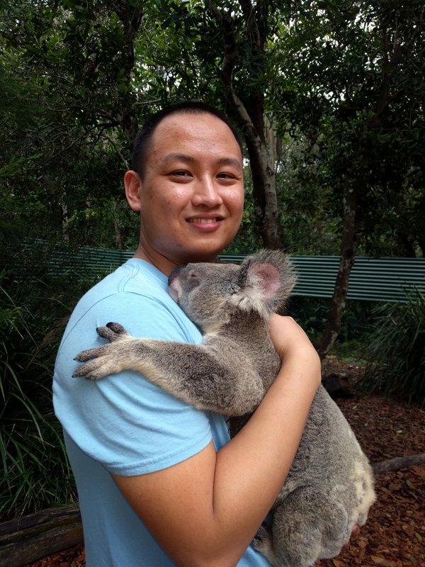 Meeting a koala (named Ellen) at the Australia Zoo
